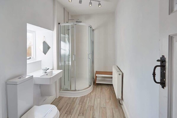 Bathtub, hair dryer, towels, soap