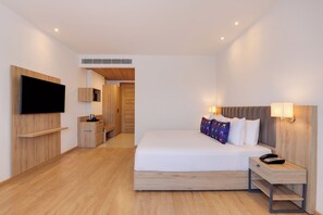 Habitación estándar | Ropa de cama de alta calidad, edredón y minibar