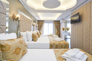 Family Room | Minibar, in-room safe, desk, laptop workspace - Sultan Suleyman Palace & Spa (Istanbul)