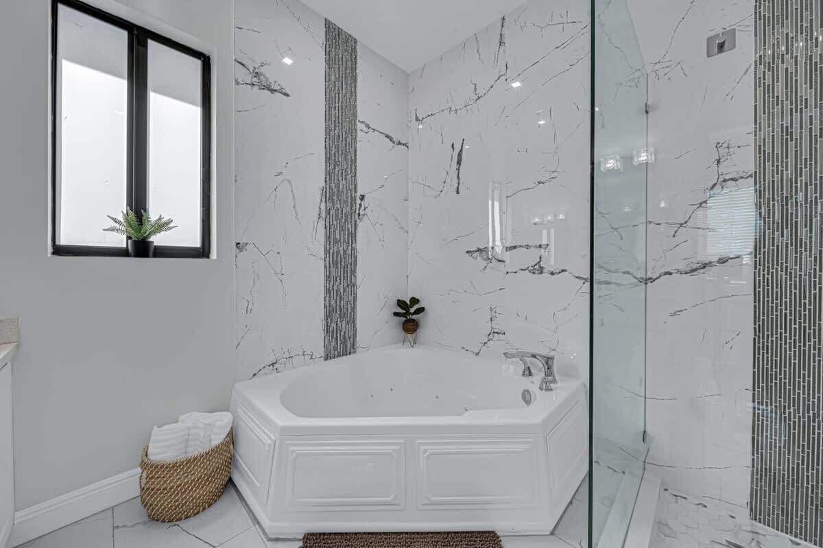 Bathtub, hair dryer, towels