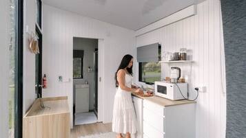 Fridge, microwave, stovetop, coffee/tea maker