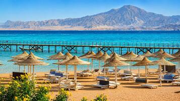 Private beach, sun-loungers, beach umbrellas, beach towels