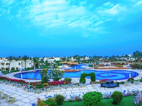 6 outdoor pools, cabanas (surcharge), pool umbrellas