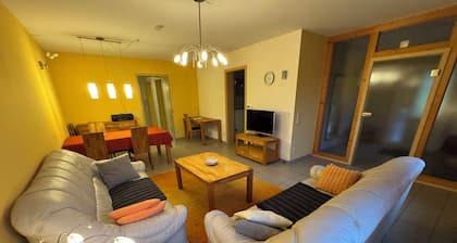 Spacious vacation apartment with a beautiful covered terrace in a huge garden.