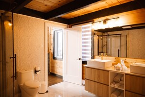 Bathtub, hair dryer, towels, soap