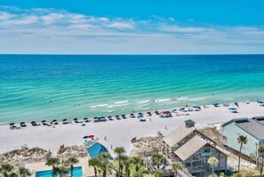 On the beach, sun loungers, beach towels