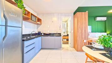 Fridge, microwave, cookware/dishes/utensils