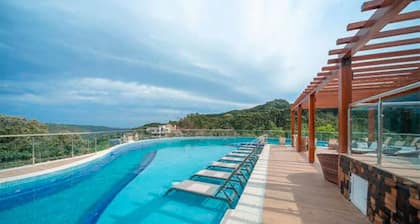 This aparthotel in the mountains features a spa and is close to Snowland Park