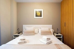 1 habitación, tabla de planchar con plancha, wifi gratis y ropa de cama 