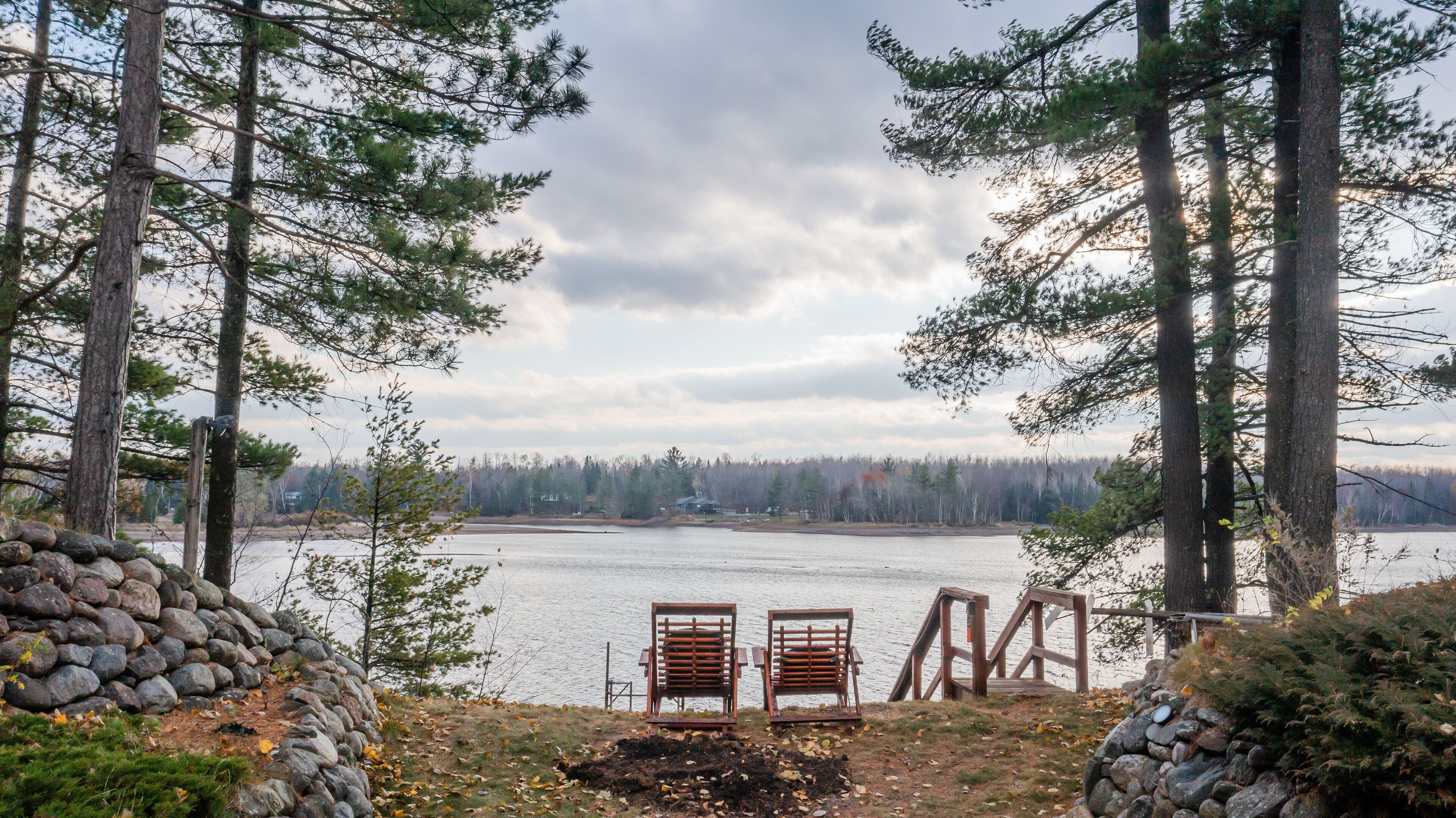 Complete serenity on this 5.5 acre modern waterfront property.