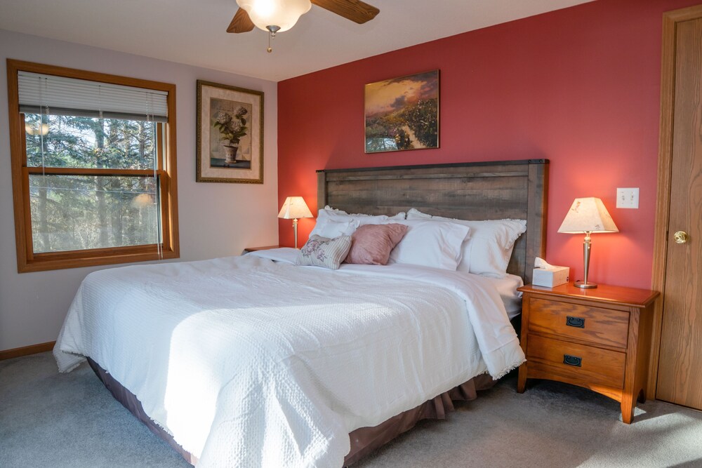 Complete serenity on this 5.5 acre modern waterfront property