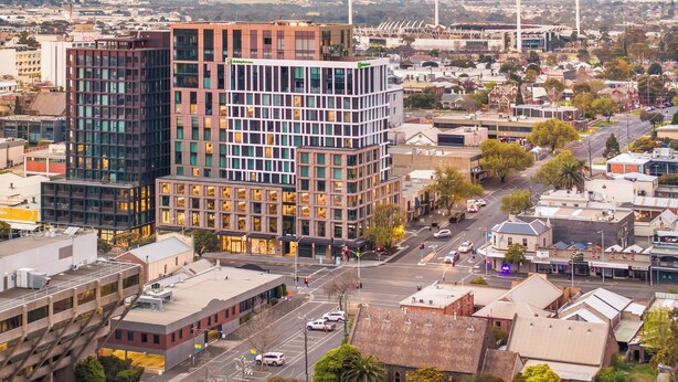 A modern urban area with a prominent building featuring a grid-like facade and large windows. - Holiday Inn & Suites Geelong by IHG (Geelong)