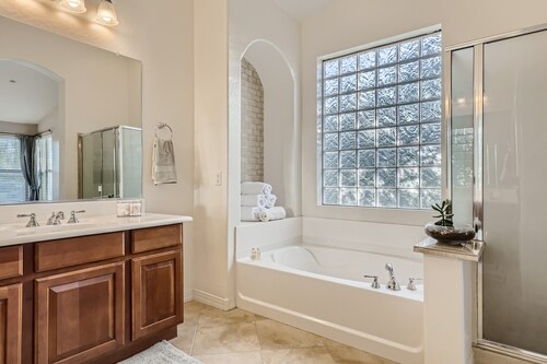 Spacious home in the heart of the West Valley with heated pool and game room