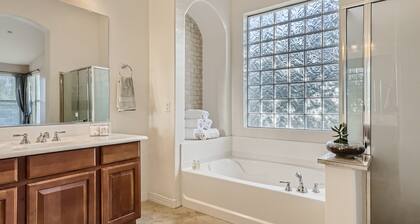 Spacious home in the heart of the West Valley with heated pool and game room