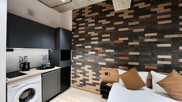 Economy Studio | Private kitchen | Fridge, microwave, stovetop, highchair