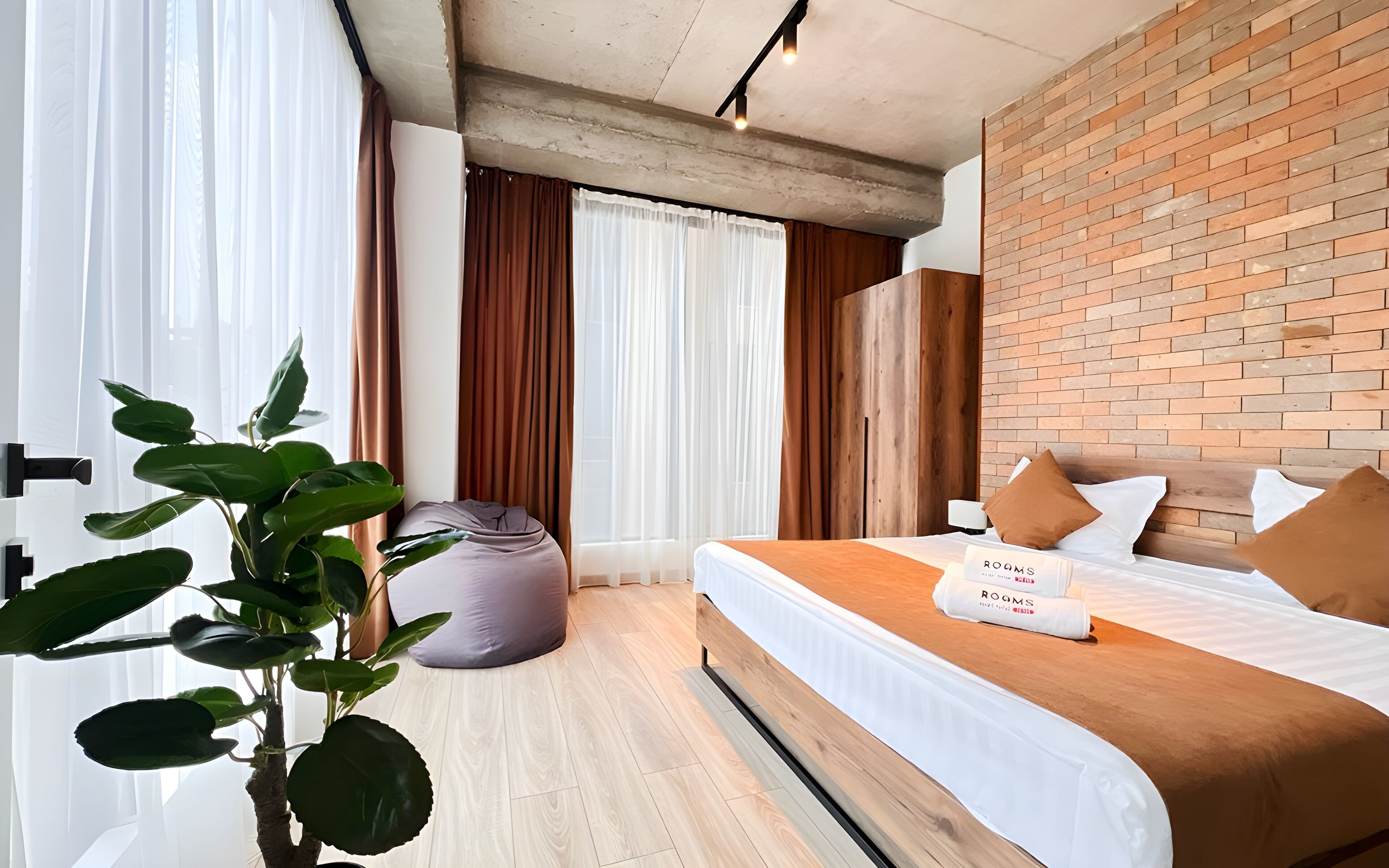 Deluxe appartement | Luxe beddengoed, een minibar, een kluis op de kamer