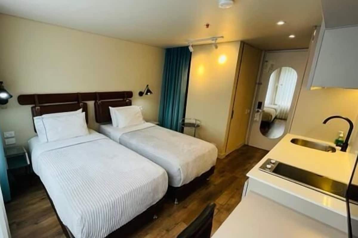 Donzen dekbedden, een minibar, een bureau, gratis wifi