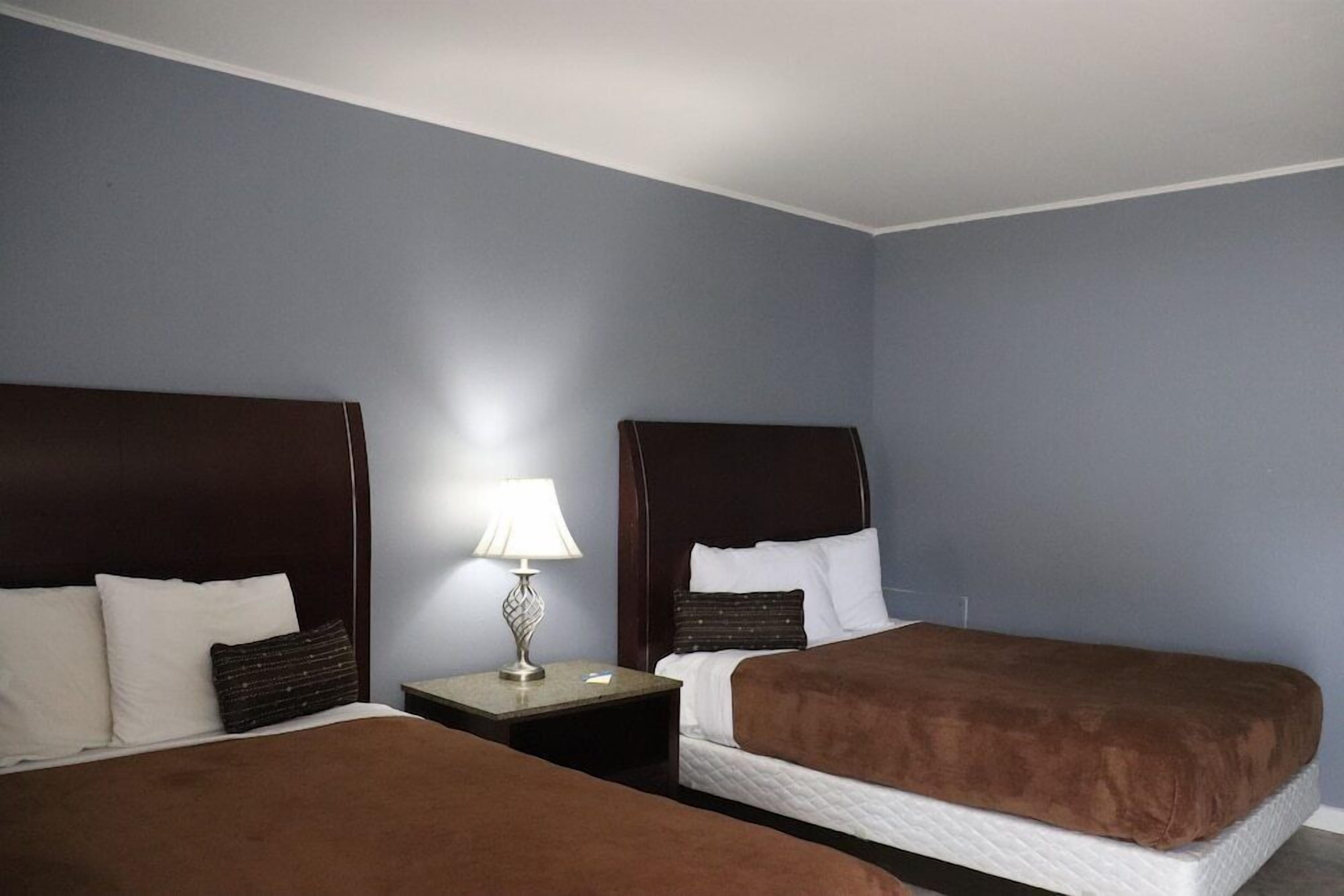 Desk, laptop workspace, free WiFi, bed sheets