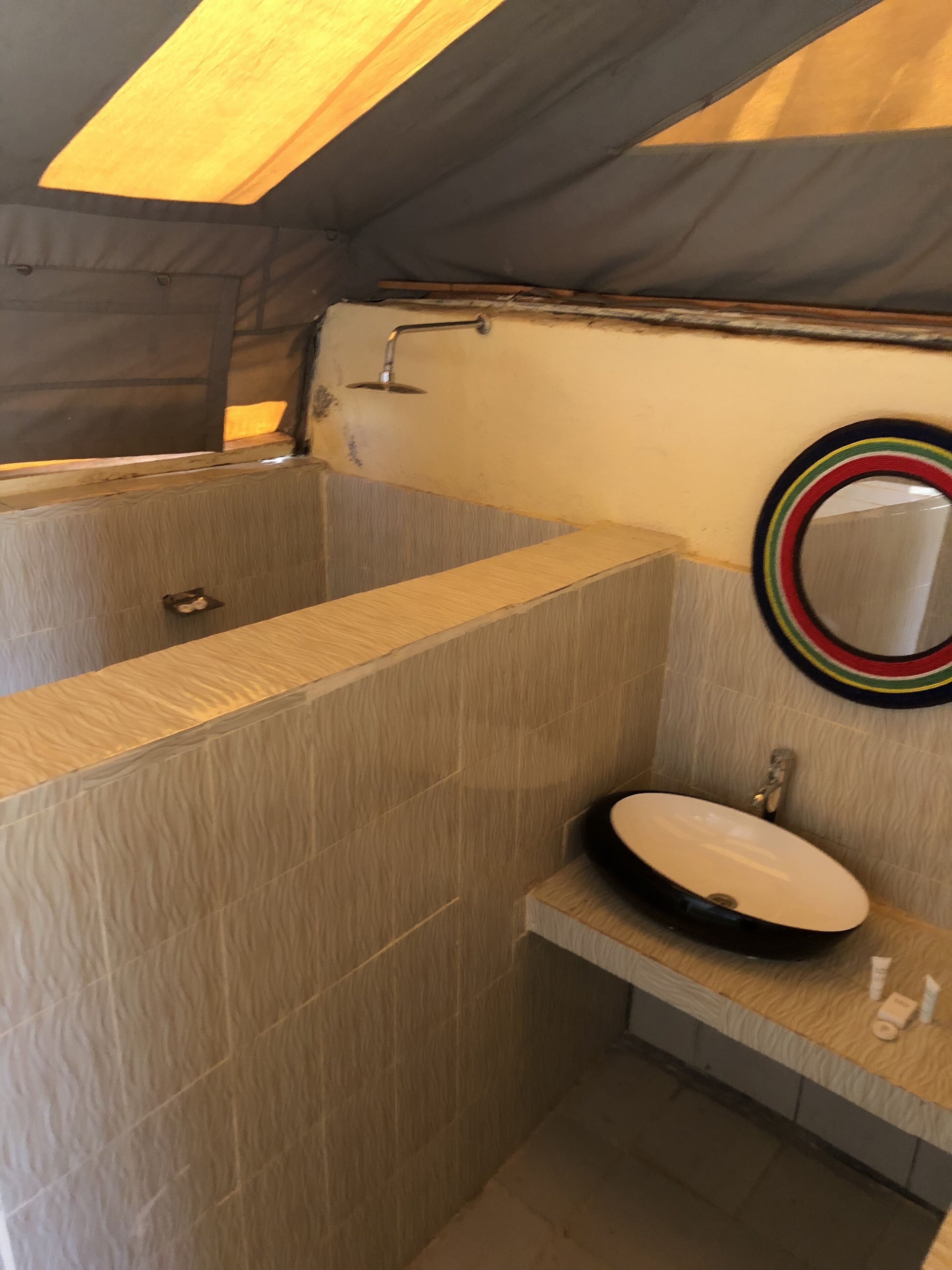 A bathroom with a bathtub, a sink, and a shower.