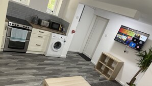 Appartamento Comfort | Area soggiorno | TV a schermo piatto