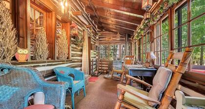 Rustic Rest Log Cabin, with hot tub and trout stream, near Poconos attractions.