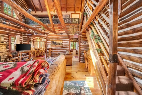 Rustic Rest Log Cabin, with hot tub and trout stream, near Poconos attractions.