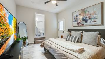 1 bedroom, desk, iron/ironing board, travel crib