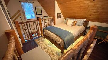 1 bedroom, desk, iron/ironing board, travel crib