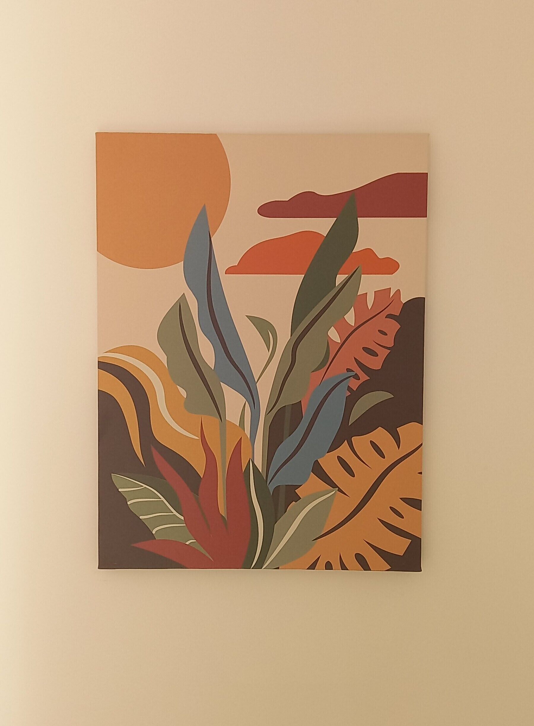 A painting of stylized tropical plants on a wall.