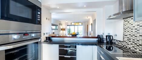 Microwave, oven, dishwasher, coffee/tea maker