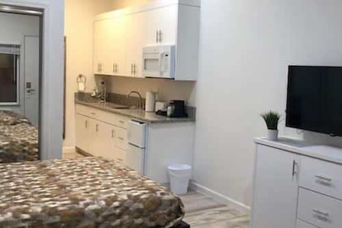 Habitación doble estándar | Cortinas blackout, wifi gratis y ropa de cama