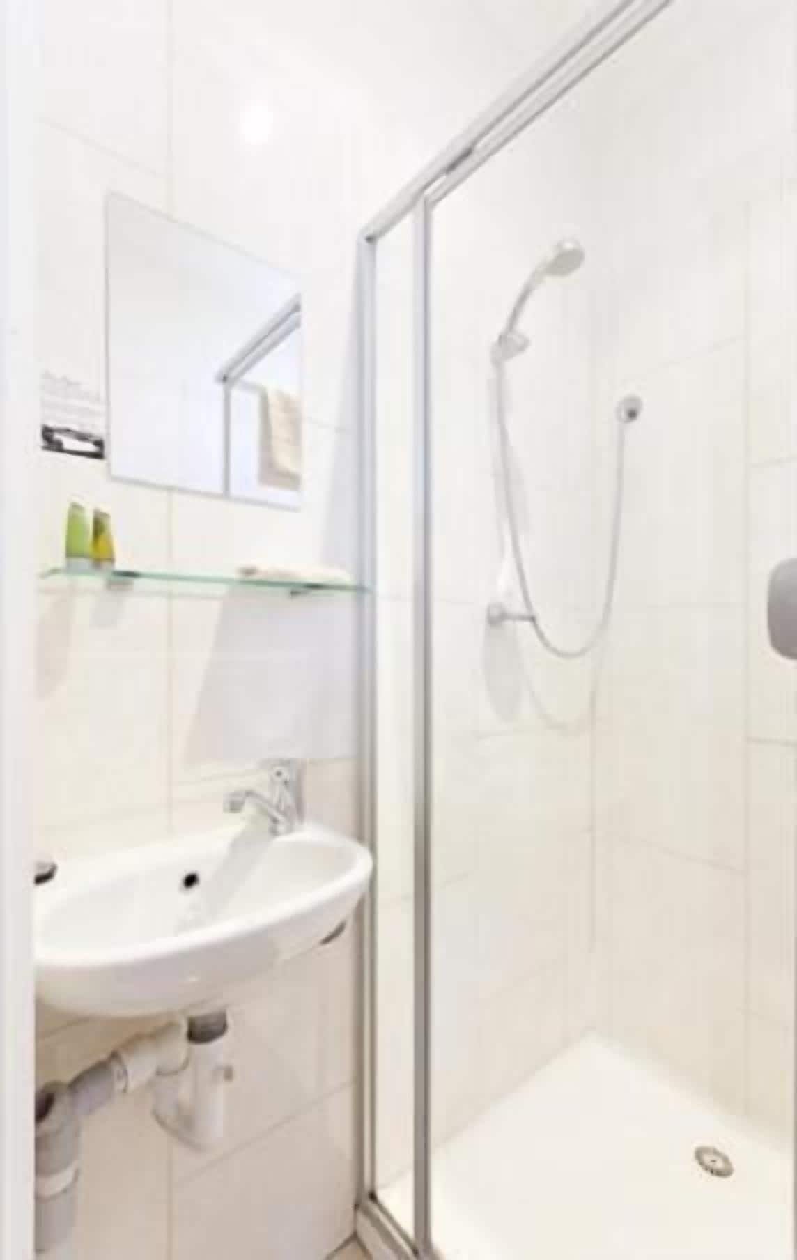 Shower, free toiletries, hair dryer, towels