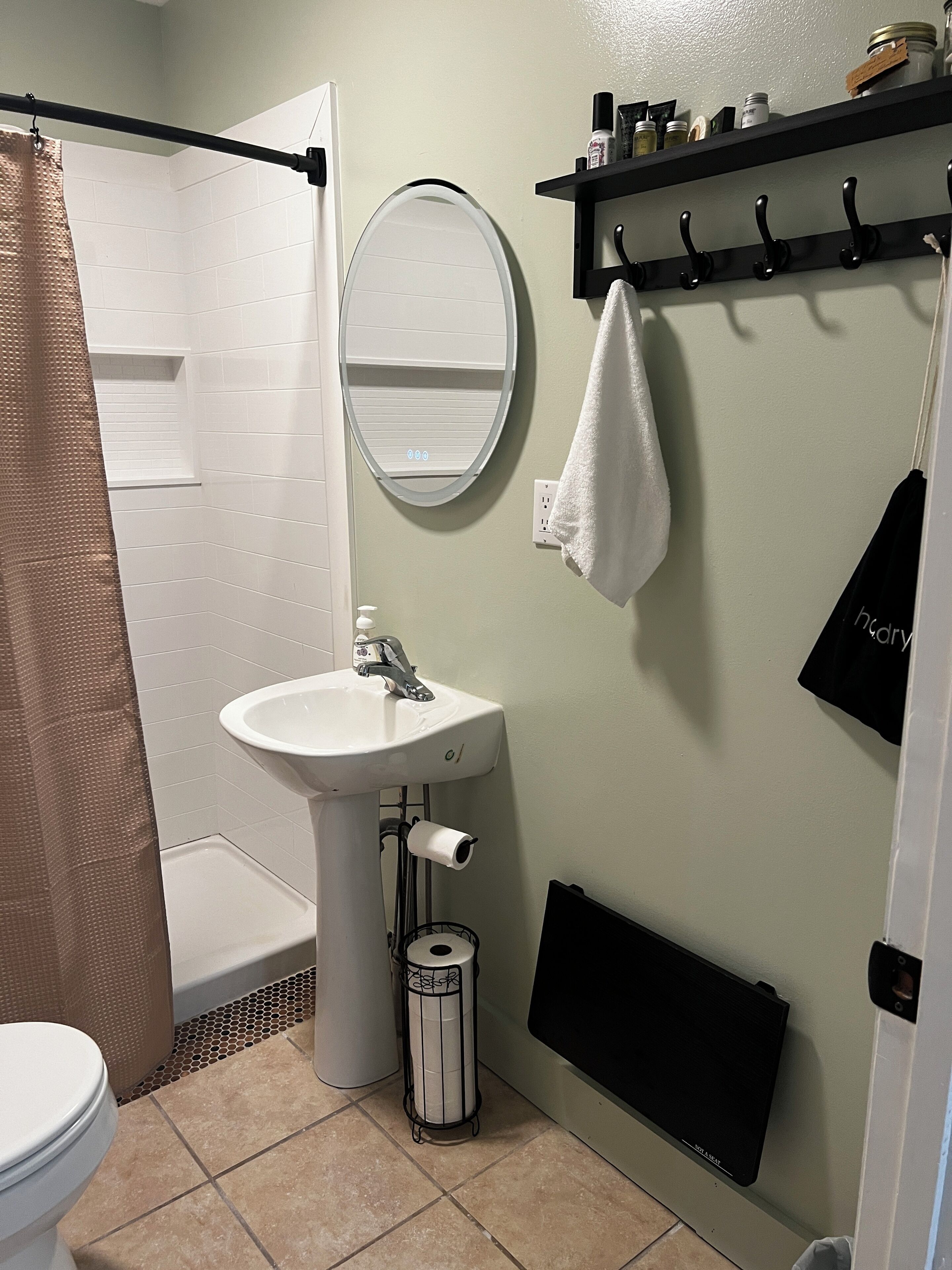 Combined shower/bathtub, hair dryer, towels, soap