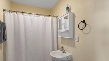 Combined shower/tub