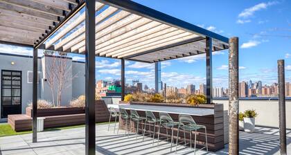 Amazing Dumbo 2BR w/ W/D, Roof & Gym, nr TimeOut Building, by Blueground