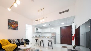 Apartamento Deluxe | Zona de estar