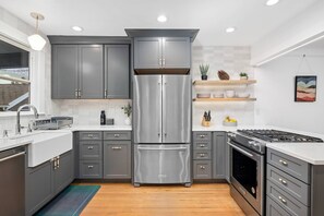 Fridge, microwave, oven, stovetop - Rhone Retreat: Luxury Craftsman w/ Steam Shower, Hot Tub, & Pool Table, BBQ, Walk to Everything (Portland)