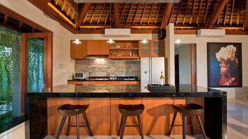 Fridge, stovetop, highchair, cookware/dishes/utensils