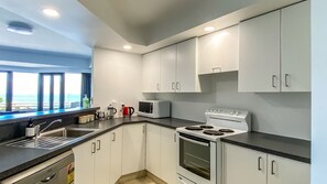 Oven, stovetop, dishwasher, coffee/tea maker - Apt12 Lakefront Apartments (Queenstown)