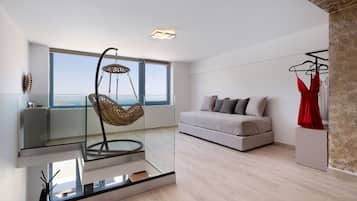 Deluxe Duplex, 2 Bathrooms, Sea View | Living area | Smart TV