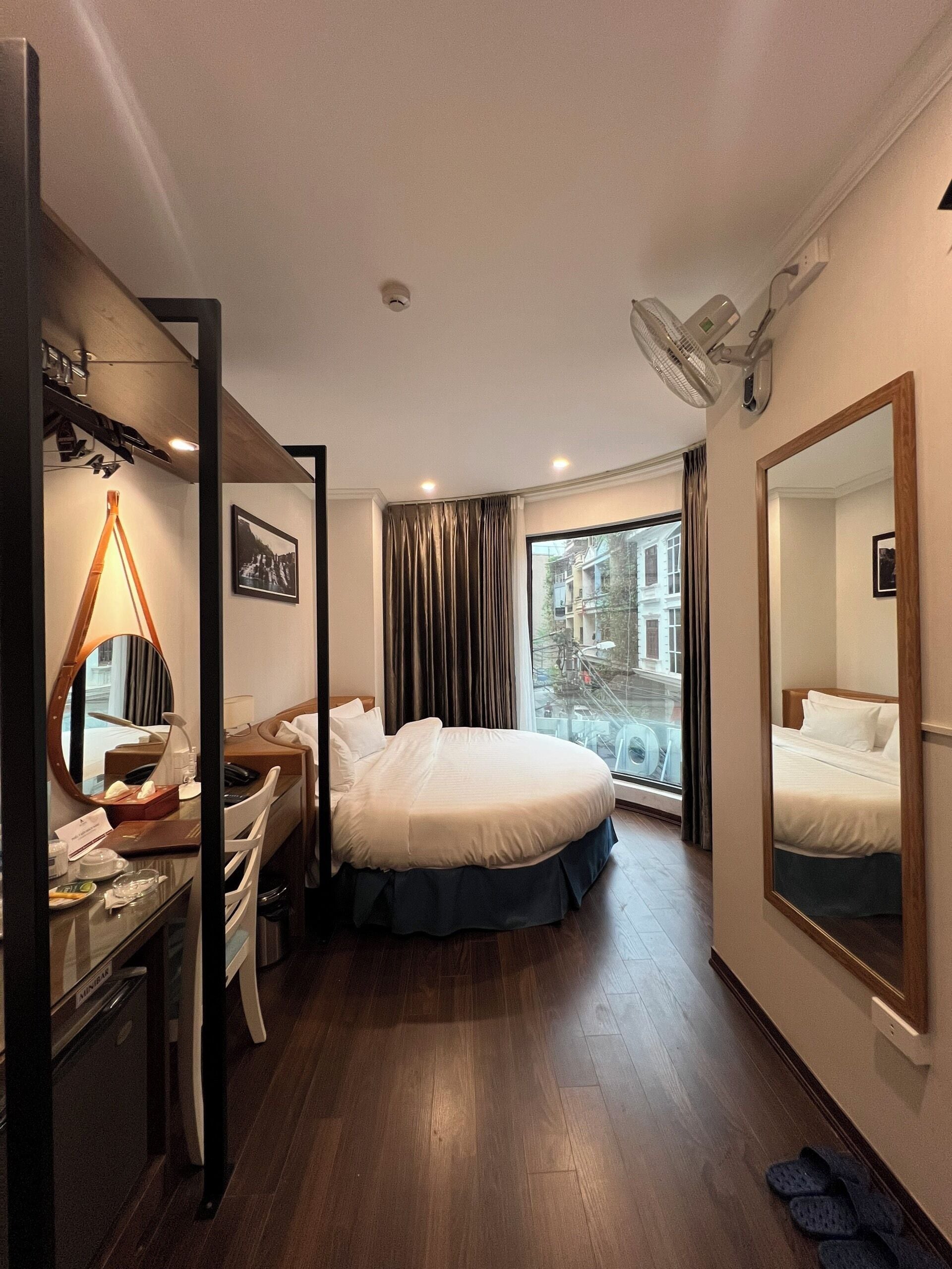 Superior Double Room | Minibar, in-room safe, blackout drapes, iron/ironing board