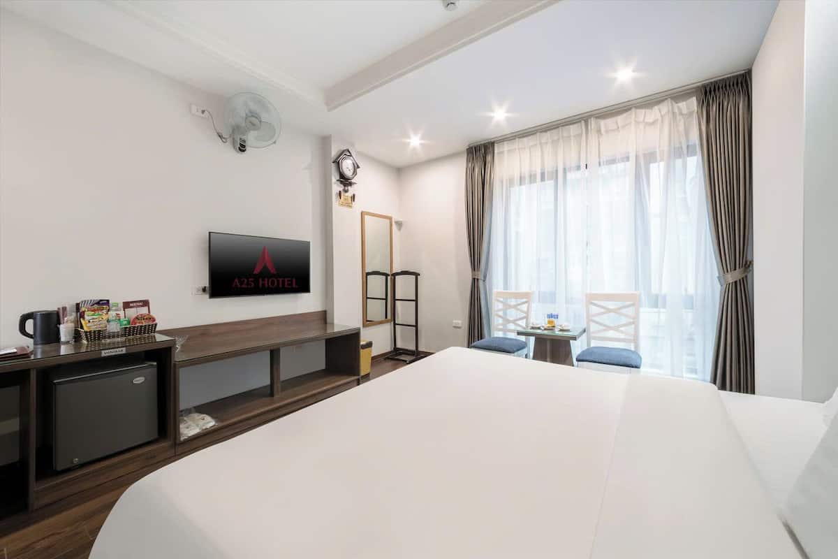 Superior Double Room | Minibar, in-room safe, blackout curtains, iron/ironing board