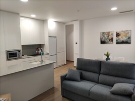 Gallery Apartment | Living area | Flat-screen TV
