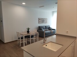 Gallery Apartment | Living area | Flat-screen TV