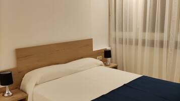 Basic Apartment | 1 bedroom, in-room safe, blackout drapes, soundproofing