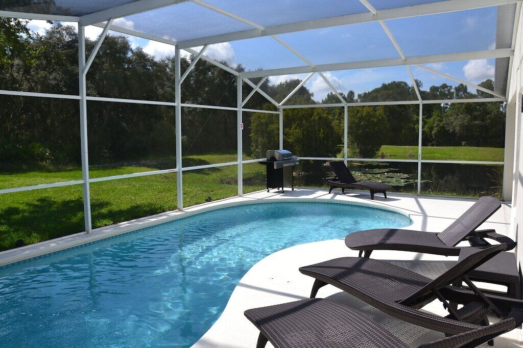 A heated pool, sun loungers