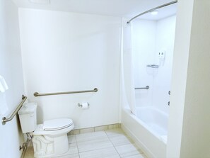 A bathroom with a toilet, a shower, and a bathtub. - Comfort Inn & Suites Panama City Beach - Pier Park Area (Panama City Beach)