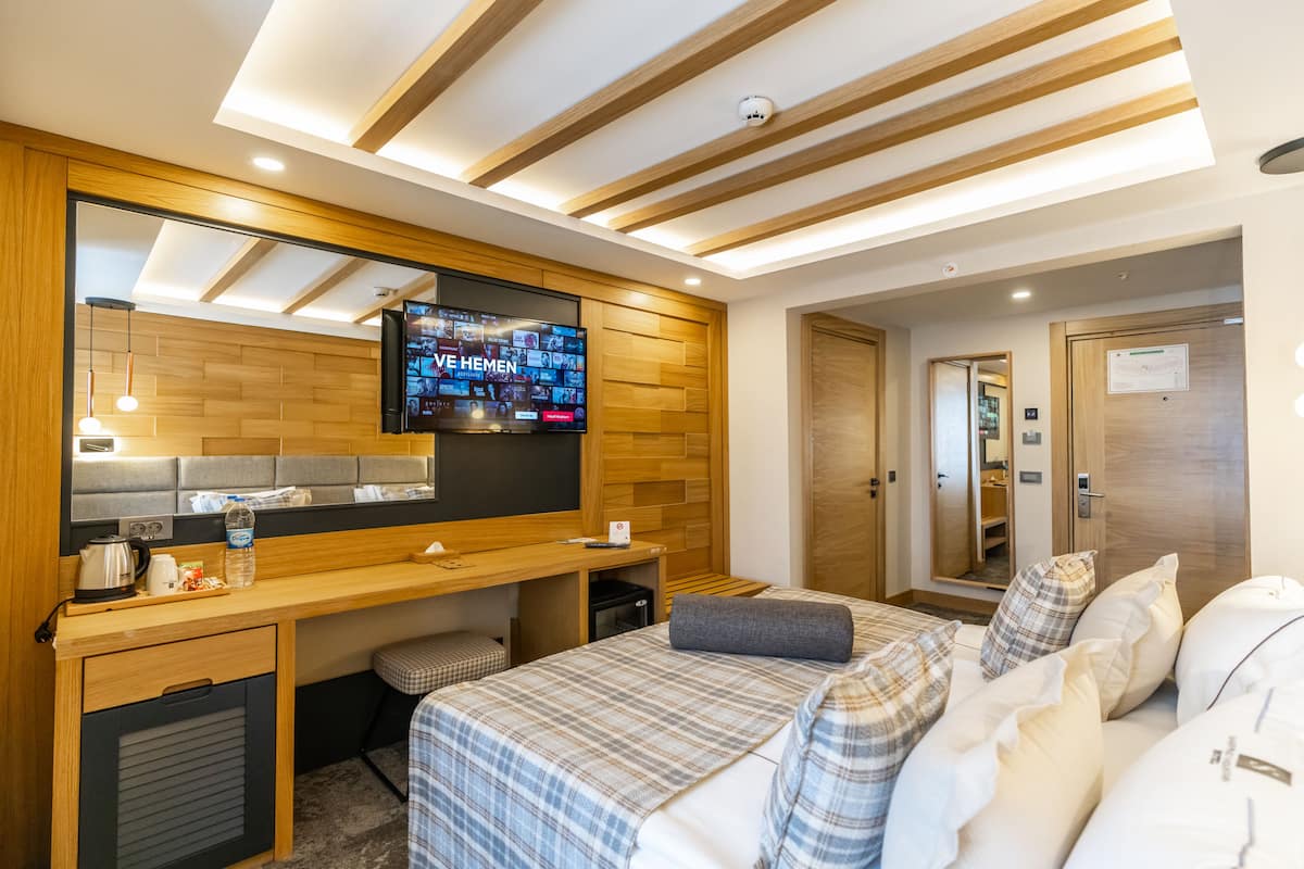 Family Room | 1 bedroom, premium bedding, minibar, in-room safe