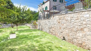 A stone building with a stone wall and a metal railing. - 3 Bedroom Villa, Private Pool, Brac Island (Sumartin)