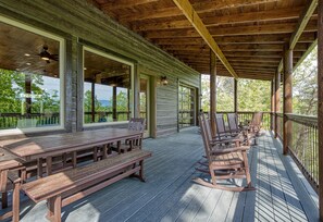 Outdoor dining - 7 Bedroom, Unique Sports Bar, INDOOR pool! LOADED! (Sevierville)